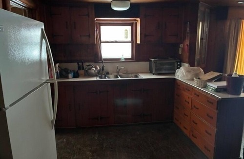 Grayling Cottage | This is a 4 bedroom, with three bathroom home. Located in the heart of Lovells with a short two track that leads to the river. Located only 3 minutes from the Lovells Riverside Tavern it offers a secluded get away for you and your friends.