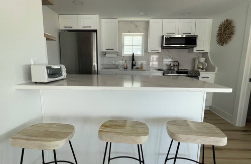 Goshen House | This spectacular home marries BEACHfront and BAYfront!