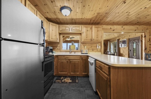 Houghton Lake Ski Chalet | True Houghton Lakefront | Sandy Beach & Dock!