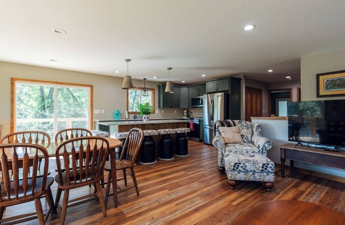 Ingalls House | Unhurried Rapids Hideaway; charming 2 bedroom home with lower level bunk area.