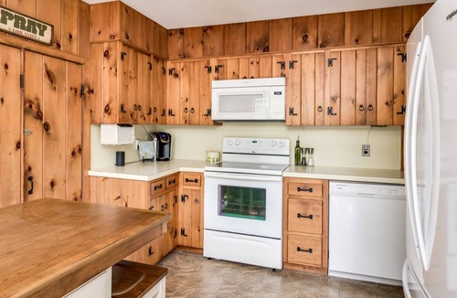 Melvin Village House | Waterfront home with boat dock, screened-in porch, large deck