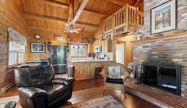Charming, dog-friendly cabin with a full kitchen, free WiFi, & private hot tub