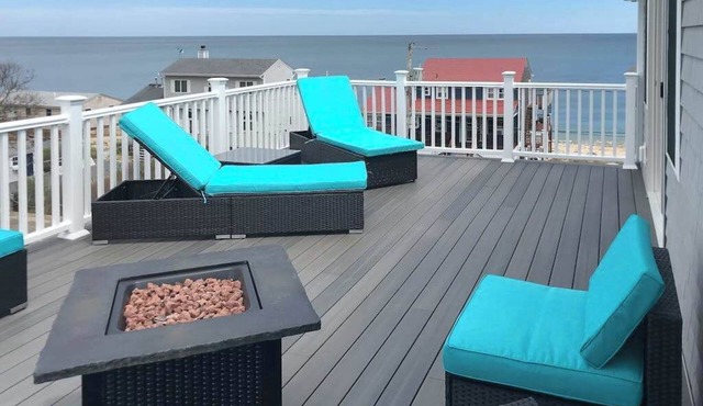 Comfortable home with rooftop deck, beach & water views, W/D, & central AC