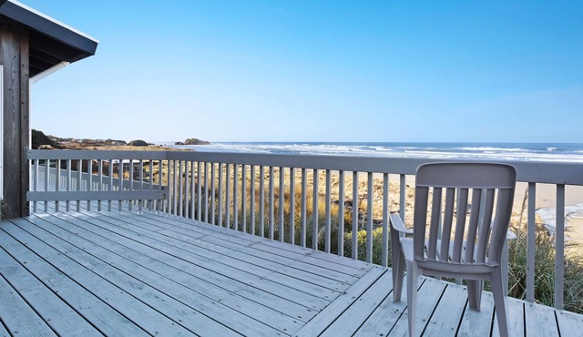 Dog-friendly, oceanfront condo w/ beach access, cozy fireplace, and large deck