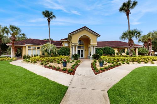 Ground floor waterview condo with resort amenities, private patio and pool