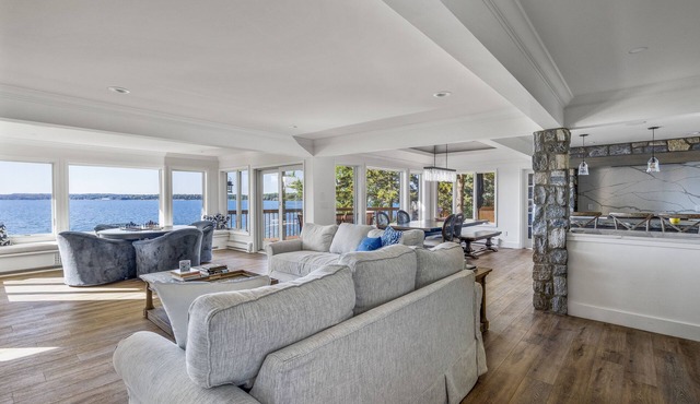 Lake Charlevoix Sanctuary · 205' Lakefront · Private Dock · Panoramic Lake Views