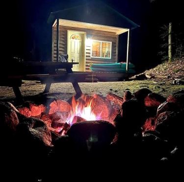 Porched Cabin for a Memorable Family Glamping Getaway near Wolf River in Wisconsin