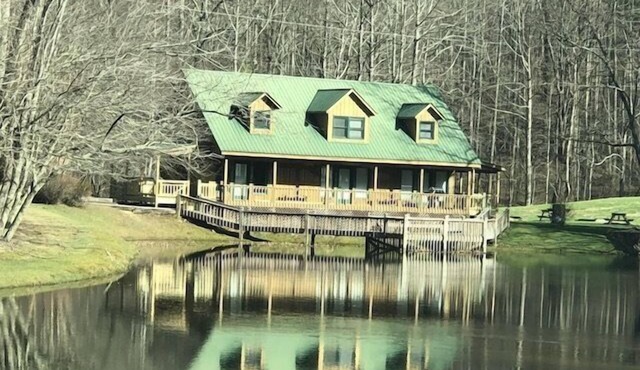 Two Queen Beds with Queen Sleeper Sofa, One Bathroom overlooking Lake