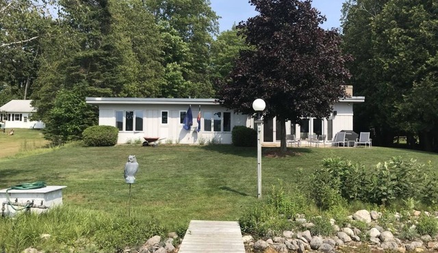 Walloon Lake lakefront mid-century modern home on North Arm. 3 Bedroom 3 bath.
